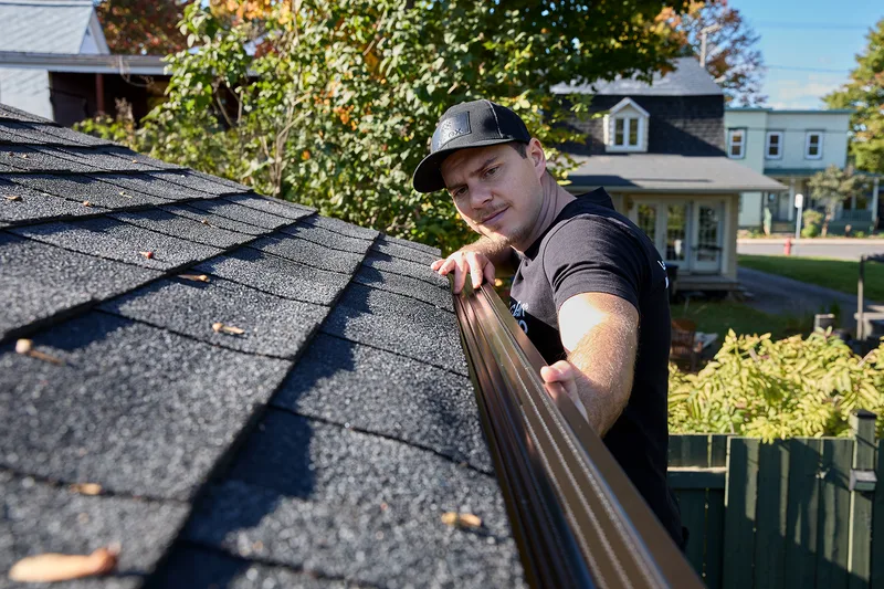 New seamless gutters and white soffit on an Owen Sound-area home